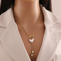 Golden Heart Drop Necklace – 18K Gold Plated Crystal Dangle Statement Piece