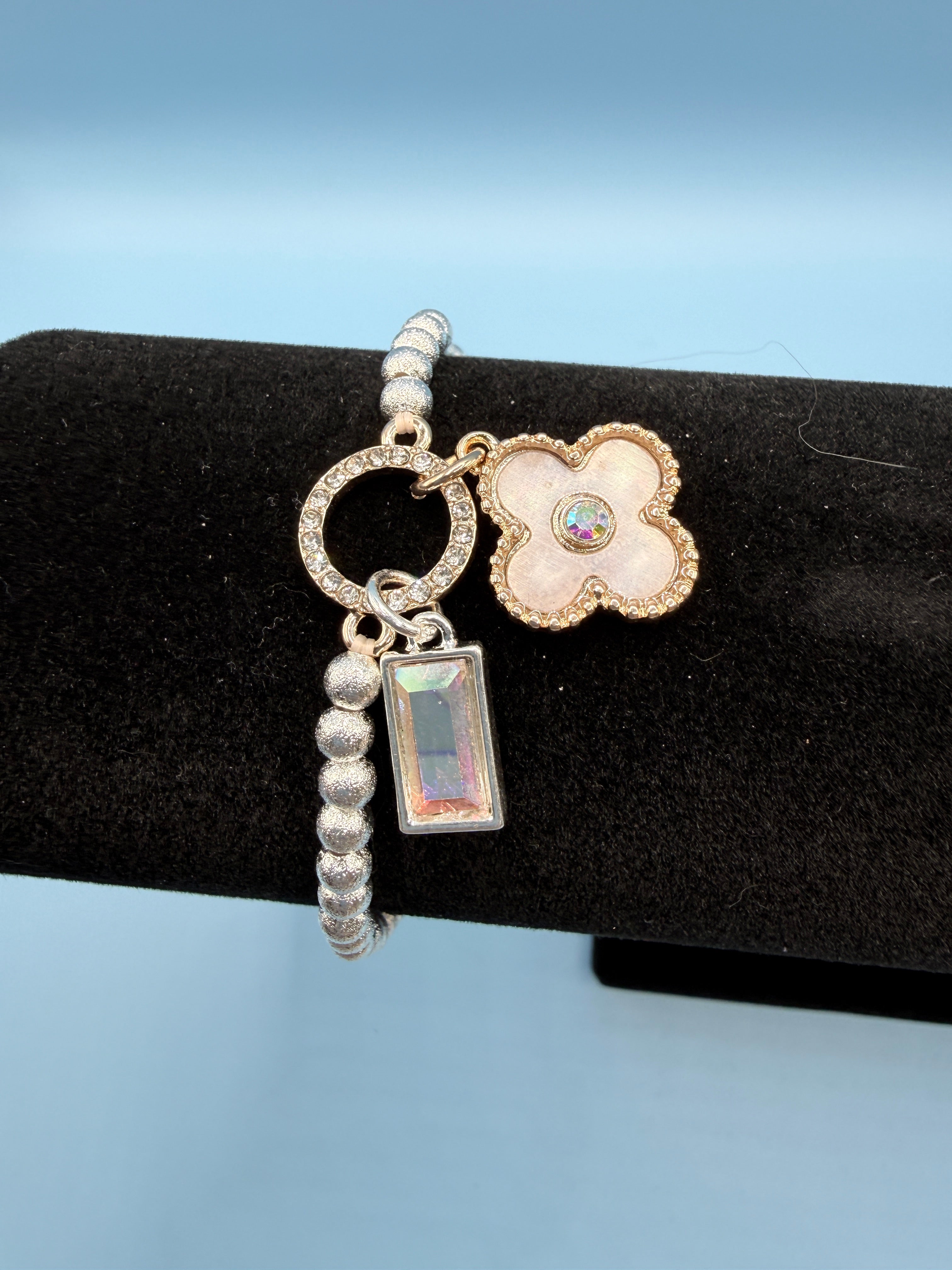 Silver Beaded Stretch Bracelet with Clover Pendant & Iridescent Prism Charm